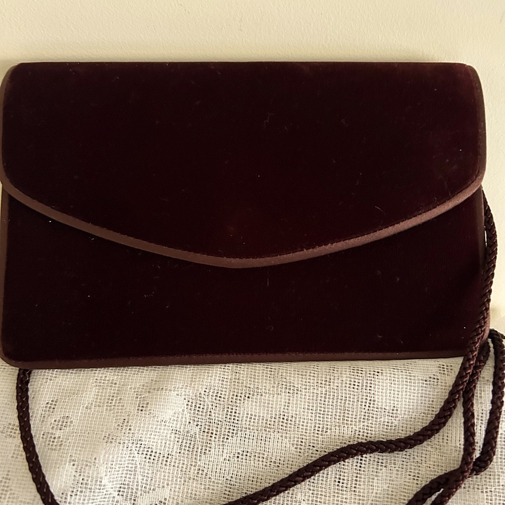 Valerie Steven’s dark burgundy velvet cocktail shoulder purse.